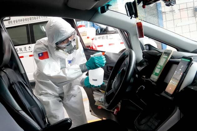 May 29, 2021, Taipei, Taipei, Taiwan: A military officer disinfects a special taxi for quarantine passengers at a fire station, where buses and taxis that carried quarantined persons are spread with disinfectant, following a surge of domestic COVID-19 cases. According to the soldier, he and his teammates have to disinfect several buses and 20 taxies, alternative, as more people are tested positive for COVID-19 amid a domestic outbreak. Taipei Taiwan - ZUMAs313 20210529_zip_s313_026 Copyright: xDanielxCengxShou-Yix