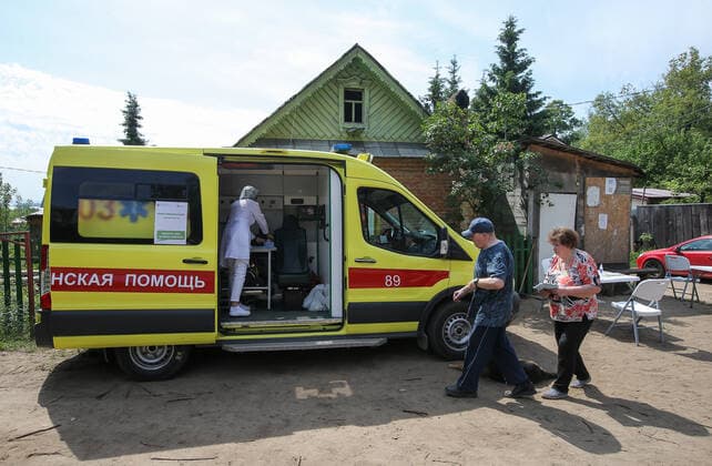 TATARSTAN, RUSSIA - MAY 29, 2021: A mobile health unit administers injections of the Gam-COVID-Vac (Sputnik V) vaccine against COVID-19 on the premises of the Volga gardening partnership. Yegor Aleyev TASS  TS10204B