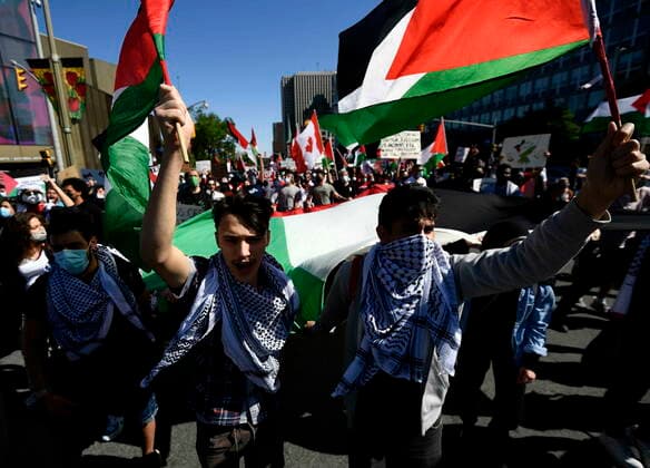 May 29, 2021, Ottawa, on, Canada: People march during a rally to denounce Israel s military actions in the Palestinian territories, in Ottawa on Saturday, May 29, 2021. Ottawa Canada  - ZUMAc35_ 20210529_zaf_c35_010 Copyright: xJustinxTangx