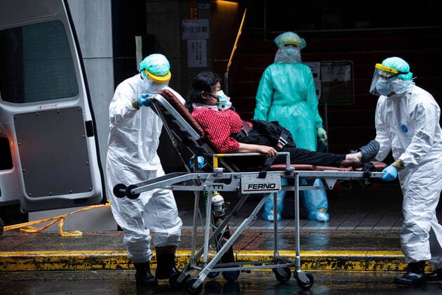 May 30, 2021, Taipei, Taiwan: Medical workers wearing protective suits seen transferring a covid-19 patient from a quarantine centre..Centre (CECC) has been placing coronavirus patients with mild symptoms in quarantine centres as hospital isolation wards begin to reach their limit due to the surge in COVID-19 cases. Taipei Taiwan - ZUMAs197 20210530_zaa_s197_026 Copyright: xAnnabellexChihx