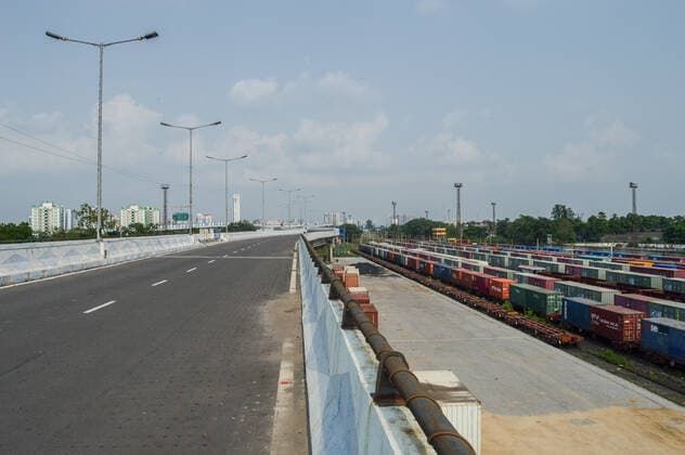 COVID-19 Lockdown In Kolkata An empty flyover is seen beside parked rows of railway goods container at a port area , during COVID-19 lockdown in Kolkata , India , on 30 May 2021 . Kolkata India chatterjee-notitle210530_npqDU  Copyright: xDebarchanxChatterjeex