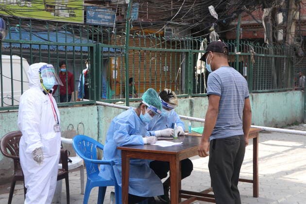 Nepal: Free covid-19 test in community level in Kathmandu Kathmandu Metropolitian City is conducting free PCR Test at the community level in all 32 ward (communities) in coordination with Department of Health Services to increase the testing of Covid-19 infection within 5 days that will mainly focus on people who work in the forefront and those who have not tested for covid-19 symptoms. Kathmandu 03-Bagmati Nepal Copyright: AbhishekxMaharjan