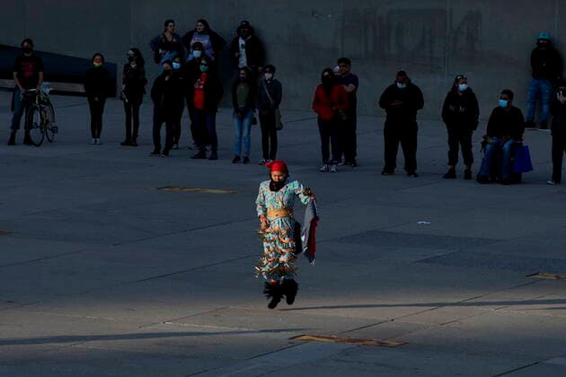 May 30, 2021, Toronto, on, Canada: Kayla Sutherland dances a prayer during a vigil in Toronto on Sunday May 30, 2021, for the 215 Indigenous children, whose remains were uncovered on the grounds of a former residential school near Kamloops, British Columbia. The discovery of a mass grave was announced late on Thursday by the TkÃ¢â‚¬â ¢emlups te Secwo pemc people after the site was examined by a team using ground-penetrating radar. Toronto Canada  - ZUMAc35_ 20210530_zaf_c35_096 Copyright: xChrisxYoungx