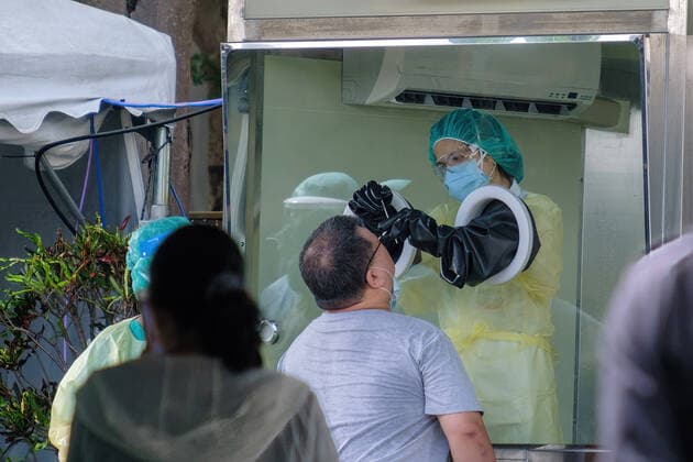 June 1, 2021, Taipei, Taiwan: A person is being tested for Covid-19 at a testing center in New Taipei City..In addition to a broader implementation of Covid-19 testing centers, Taiwan signs a deal for 10 million doses of domestically-made COVID vaccines. Taipei Taiwan - ZUMAs197 20210601_zaa_s197_007 Copyright: xWalidxBerrazegx