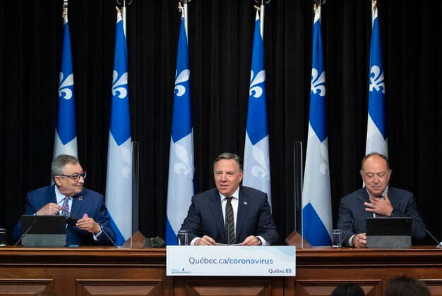 June 1, 2021, QUEBEC, PQ, Canada: Quebec Premier Francois Legault, centre, speaks during a news conference on the COVID-19 pandemic, Tuesday, June 1, 2021 at the legislature in Quebec City. Legault is flanked by Horacio Arruda, Quebec director of National Public Health, left and Quebec Health Minister Christian Dube. QUEBEC Canada - ZUMAc35_ 20210601_zaf_c35_042 Copyright: xJacquesxBoissinotx