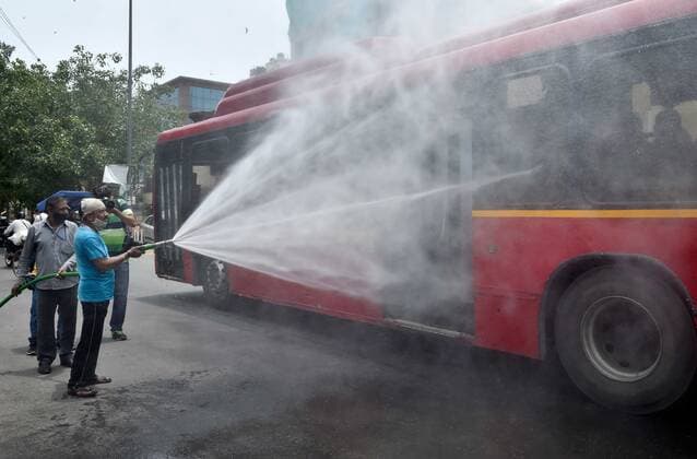 NEW DELHI, INDIA - JUNE 1: A North Delhi Municipal Corporation worker sanitizing an area as a preventive measure against the spread of the Covid-19 at Karol Bagh on June 1, 2021 in New Delhi, India. (Photo by Ajay Aggarwal Hindustan Times) Sanitation Drive To Curb The Covid-19 Pandemic