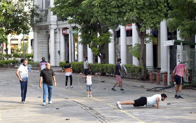 NEW DELHI, INDIA - JUNE 1: People exercising, waking and playing in an open space at Connaught Place during a Covid-19 lockdown in morning on June 1, 2021 in New Delhi, India.(Photo by Arvind Yadav Hindustan Times) People Enjoy Open Space In Morning At Connaught Place During A Covid-19 Lockdown
