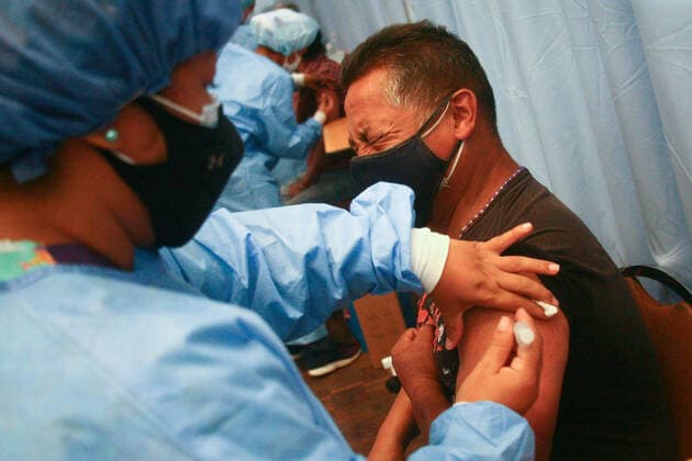Massive Vaccination Day Against Covid-19 In Caracas A man receives a dose of Sputnik V vaccine during a mass vaccination day against Covid-19, at the Alba hotel in Caracas, Venezuela on June 01, 2021. Caracas Venezuela campos-notitle210601_npU4V  Copyright: xJavierxCamposx