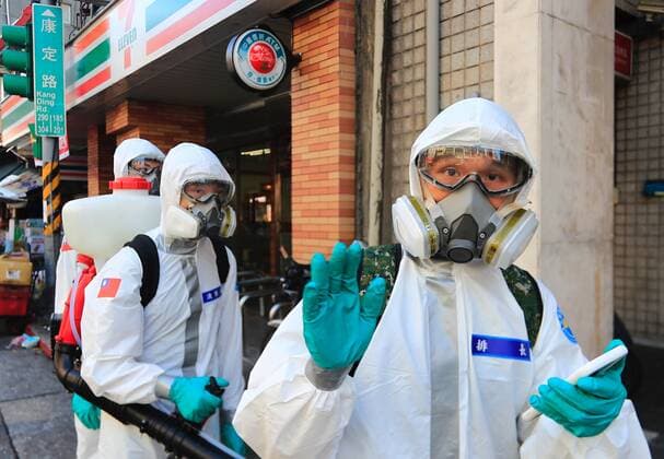 Virus Outbreak Taiwan Military officers with a PPE disinfect areas of Wanhua, Taipei, following a surge of domestic cases and deaths, in Taipei, Taiwan, 2 June 2021. The country has been facing a shortage of vaccines alongside the impact on its economy caused by the pandemic. Taipei Taiwan ceng-notitle210602_npOjL  Copyright: xCengxShouxYix