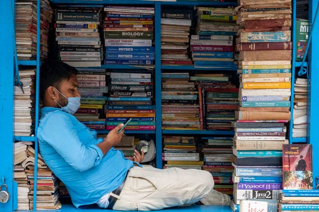 Coronavirus Emergency In Kolkata A shopkeeper is sitting at the bookstalls as the state Govt has given some relaxation for small retail shops amid state-wide lockdown in Kolkata, India, on June 2, 2021. The Government has given several exception for some small retail shops during a lockdown imposed by West Bengal state to curb the spread of Covid-19 second wave. Kolkata West Bengal India bose-notitle210602_npriC  Copyright: xDipayanxBosex