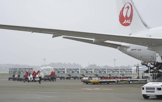 Japan provides 1.24 mil. doses of COVID-19 vaccine to Taiwan Containers of COVID-19 vaccine are seen before being loaded onto a Japan Airlines plane at Narita airport near Tokyo on June 4, 2021. Japan shipped 1.24 million doses of COVID-19 vaccine to Taiwan the same day in an effort to help the self-ruled island alleviate its struggles in procuring shots amid a surge of coronavirus cases. 