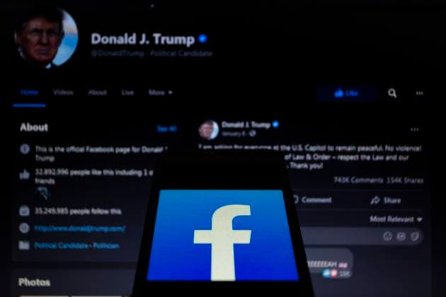 June 4, 2021, Asuncion, Paraguay: Illustration photo - App icon of Facebook is displayed on a smartphone backdropped by Donald Trump s Facebook account. Facebook Inc. said it is suspending Donald Trump s accounts for two years, effective from the date of the initial suspension on January 7 this year. Asuncion Paraguay - ZUMAc217 20210604_zip_c217_003 Copyright: xAndrexM.xChangx