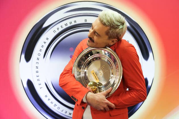 MOSCOW, RUSSIA â€“ JUNE 4, 2021: Singer Dima Bilan holds a trophy for the Best Artist of the Last 25 Years at a ceremony to present the 2021 Muz-TV Music Awards, at the Megasport Arena. Sergei Karpukhin TASS  TS10394E