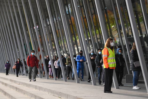 VICTORIA CORONAVIRUS COVID19, People are seen waiting in line at the Melbourne Convention and Exhibition Centre vaccination clinic in Melbourne, Saturday, June 5, 2021. Victoria has recorded five new cases of locally acquired coronavirus in the past 24 hours. ( NO ARCHIVING, EDITORIAL USE ONLY, NO USE IN BOOKS WITHOUT CONSENT MELBOURNE VIC AUSTRALIA  Copyright: xJAMESxROSSx 20210605001547447557