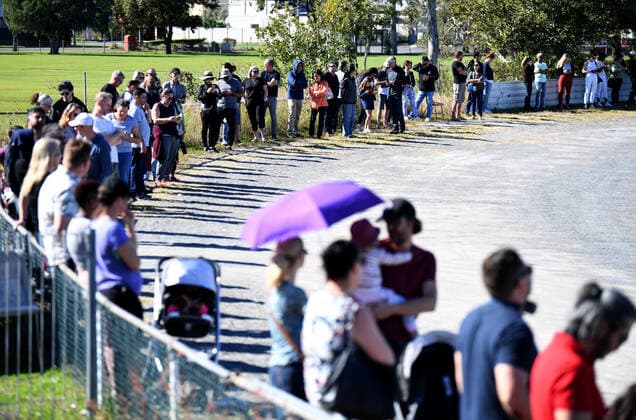 QLD COVID19 VACCINATION HUB, People line up to receive a coronavirus vaccination at the Rocklea Showgrounds in Brisbane, Saturday, June 5, 2021. The Queensland government has launched a drive to fully vaccinate all private aged care and disability workers against COVID-19 within three weeks, with 18 hubs across the state opening from Saturday. ( NO ARCHIVING, EDITORIAL USE ONLY, NO USE IN BOOKS WITHOUT CONSENT BRISBANE QLD AUSTRALIA  Copyright: xDANxPELEDx 20210605001547478186