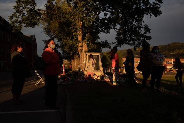 June 4, 2021, Kamloops, BC, Canada: People listen as a group of youths drum and sing at sunset outside the former Kamloops Indian Residential School, to honour the 215 children whose remains have been discovered buried near the facility, in Kamloops, B.C., on Friday, June 4, 2021. Kamloops Canada - ZUMAc35_ 20210604_zaf_c35_161 Copyright: xDarrylxDyckx