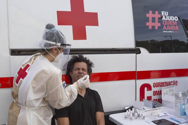 A Portuguese Red Cross health worker its seen performing a COVID19 test on a person on June 4, 2021 in Lisbon, Portugal. Covid19 numbers in Portugal are rising and the Portuguese Red Cross has a plan offering Free COVID-19 tests around the city, mostly in turistic sites. Where: Lisbon, Portugal When: 04 Jun 2021 Credit: Luis Boza Cover Images Copyright: xLuisxBozax 41480188 EDITORIAL USE ONLY. NOT FOR USE BY NEWSPAPERS BASED IN THE UK.
