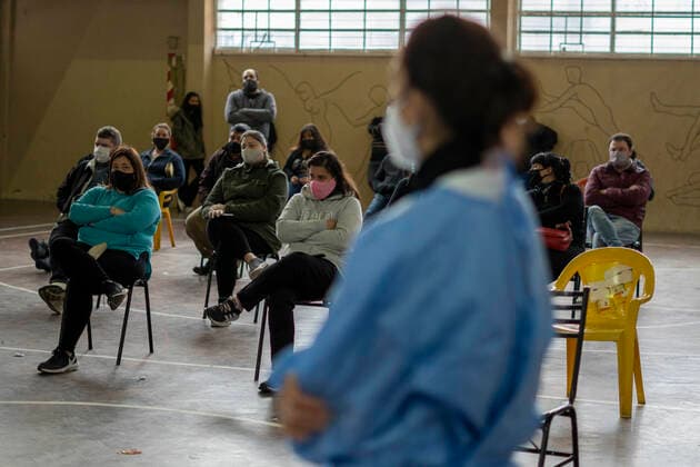 June 5, 2021, Firmat, Santa Fe, Argentina: Inside a makeshift vaccination center in a basketball court, people wait for their turn to get a shot of COVID-19 vaccine. Firmat Argentina - ZUMAm105 20210605_zaf_m105_013 Copyright: xPatricioxMurphyx