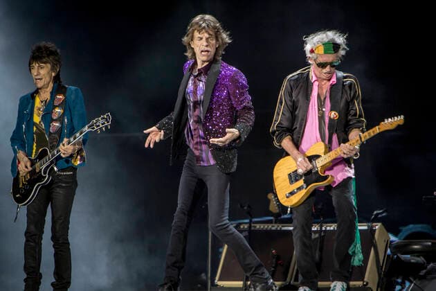The Rolling Stones The legendary English rock band The Rolling Stones performs a live concert at Orange Stage at Roskilde Festival 2014. Here lead singer and songwriter Mick Jagger is pictured live on stage with guitarist Ronnie Wood (L) and Keith Richards (R). Denmark, 03.07.2014. Roskilde Denmark  Copyright: xGonzalesxPhoto KimxMatthaixLelanx