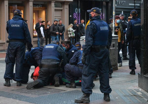 19 People Arrested For Public Order Offences In Dublin On Saturday Night Members of Gardai surround a young man on Grafton Street in Dublin, on Saturday evening, June 5, 2021. Nineteen people were arrested on suspicion of violating public order after another night of rioting in downtown Dublin. Glass bottles and other missiles were thrown at the gardai after they collided with large crowds in the city on Saturday night. On Sunday, 6 June 2021, in Dublin, Ireland. Dublin Ireland widak-19people210606_npSG3  Copyright: xArturxWidakx