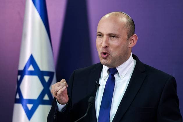 Bilder des Jahres 2021, News 06 Juni News Themen der Woche KW22 Naftali Bennett, Israeli parliament member from the Yamina party, gives a statement at the Knesset, Israel s parliament, in Jerusalem on Sunday, June 6, 2021. Bennett is expected to be Israel s next Prime Minister if a coalition holds. Pool  JERX202106060 MENAHEMxKAHANA