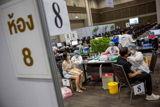 June 7, 2021, Bangkok, Bangkok, Thailand: Medical personnel administer locally produced AstraZeneca vaccine shots to members of the public in a vaccination center inside BangkokÃ¢â‚¬â ¢s upscale Siam Paragon shopping mall. The mass effort to vaccinate ThailandÃ¢â‚¬â ¢s population against the novel coronavirus started on Monday, June 7th with hundreds of vaccination centers having been set up in the nationÃ¢â‚¬â ¢s capitol Bangkok and nationwide. Both imported Chinese made Sinovac and domestically produced AstraZeneca vaccine injections are being used, with a goal set the inoculate 70% of the population by the end of the year to achieve herd immunity. Bangkok Thailand - ZUMAt128 20210607_zap_t128_005 Copyright: xAdryelxTalamantesx