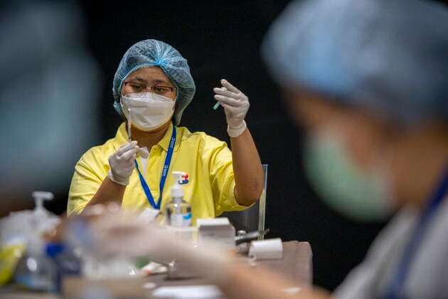 June 7, 2021, Bangkok, Bangkok, Thailand: Medical staff fill syringes with Thai made AstraZeneca vaccine at a vaccination center set up in BangkokÃ¢â‚¬â ¢s high end Siam Paragon shopping mall. The mass effort to vaccinate ThailandÃ¢â‚¬â ¢s population against the novel coronavirus started on Monday, June 7th with hundreds of vaccination centers having been set up in the nationÃ¢â‚¬â ¢s capitol Bangkok and nationwide. Both imported Chinese made Sinovac and domestically produced AstraZeneca vaccine injections are being used, with a goal set the inoculate 70% of the population by the end of the year to achieve herd immunity. Bangkok Thailand - ZUMAt128 20210607_zap_t128_010 Copyright: xAdryelxTalamantesx