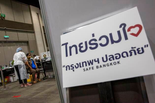 June 7, 2021, Bangkok, Bangkok, Thailand: Medical personnel administers a locally produced AstraZeneca vaccine shot to a member of the public in a vaccination center inside BangkokÃ¢â‚¬â ¢s upscale Siam Paragon shopping mall. The mass effort to vaccinate ThailandÃ¢â‚¬â ¢s population against the novel coronavirus started on Monday, June 7th with hundreds of vaccination centers having been set up in the nationÃ¢â‚¬â ¢s capitol Bangkok and nationwide. Both imported Chinese made Sinovac and domestically produced AstraZeneca vaccine injections are being used, with a goal set the inoculate 70% of the population by the end of the year to achieve herd immunity. Bangkok Thailand - ZUMAt128 20210607_zap_t128_016 Copyright: xAdryelxTalamantesx