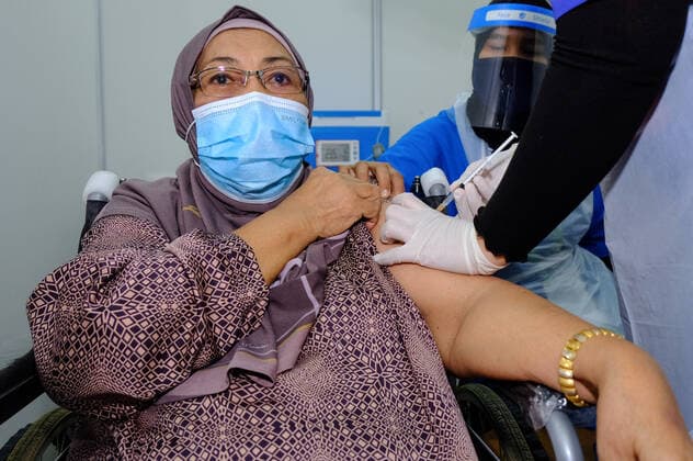 June 7, 2021, Shah Alam, Malaysia: A health worker administers a first dose of Sinovac vaccine to a person at Uitm Puncak Alam, Selangor..Malaysia Health Minister, Dr Adham Baba said Malaysia has delivered 3.57million Covid-19 vaccine shots and more than one million individuals had received two doses of the vaccine. Kuala Lumpur had the highest vaccine recipient with 508,358 Covid-19 vaccine shots involves and followed by Selangor at 398,697 shots. Shah Alam Malaysia - ZUMAs197 20210607_zaa_s197_111 Copyright: xFarisxHadziqx