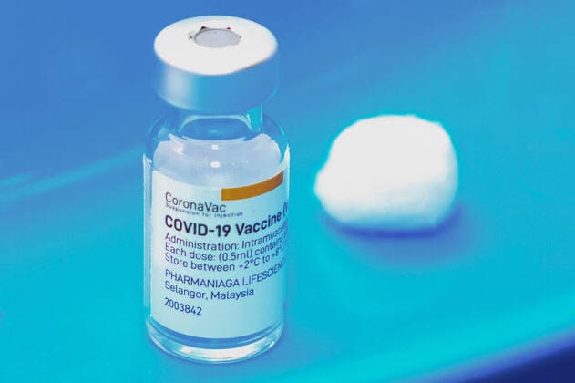 June 7, 2021, Shah Alam, Malaysia: A Sinovac vaccine vial seen on a table at Uitm Puncak Alam, Selangor..Malaysia Health Minister, Dr Adham Baba said Malaysia has delivered 3.57million Covid-19 vaccine shots and more than one million individuals had received two doses of the vaccine. Kuala Lumpur had the highest vaccine recipient with 508,358 Covid-19 vaccine shots involves and followed by Selangor at 398,697 shots. Shah Alam Malaysia - ZUMAs197 20210607_zaa_s197_114 Copyright: xFarisxHadziqx