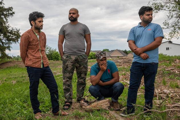 June 7, 2021, London, on, Canada: People attend a memorial at the location where a family of five was hit by a driver, in London, Ont., Monday, June 7, 2021. Four of the members of the family died and one is in critical condition. A 20 year old male has been charged with four counts of first degree murder and count of attempted murder in connection with the crime. London Canada  - ZUMAc35_ 20210607_zaf_c35_073 Copyright: xBrettxGundlockx