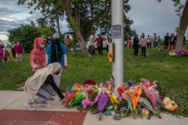 June 7, 2021, London, on, Canada: Mourners leave flowers at the site where a family of five was hit by a driver, in London, Ont., Monday, June 7, 2021. Four of the members of the family died and one is in critical condition. A 20 year old male has been charged with four counts of first degree murder and count of attempted murder in connection with the crime. London Canada  - ZUMAc35_ 20210607_zaf_c35_075 Copyright: xBrettxGundlockx