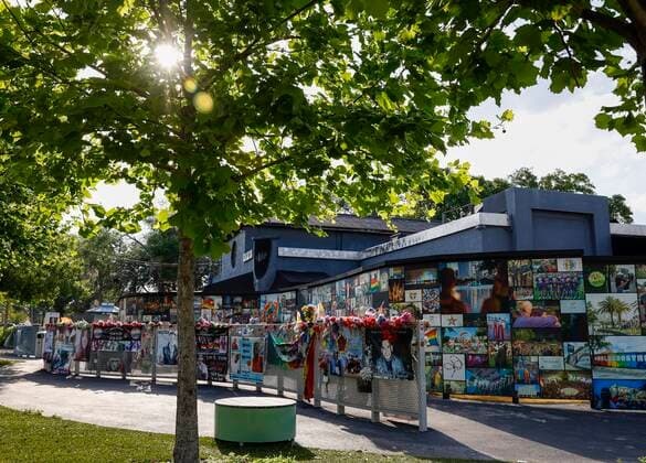 April 28, 2021, Orlando, Florida, USA: The sun peaks through the trees as photos, sayings, and tributes are seen outside of Pulse Wednesday, April 28, 2021 in Orlando. On June 12, 2016 29 year-old Omar Mateen walked into the popular night club and killed 49 people and injured more than 50. The club has become a place for visitors to reflect on the tragic shooting. Orlando USA - ZUMAs70_ 20210428_zan_s70_032 Copyright: xChrisxUrsox