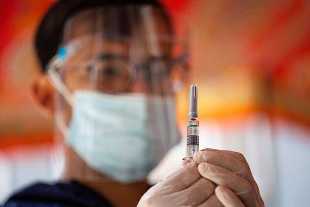Nepal Continue COVID-19 Vaccination Drive A health worker prepares to inoculate a dose of the Vero cell COVID-19 vaccine in Kathmandu, Nepal on Tuesday, June 8, 2021. After receiving 1 million doses of the COVID-19 vaccine from china, the Nepal government has continued vaccination for the 60-64 age groups. Kathmandu Nepal shrestha-notitle210608_npuWH  Copyright: xRojanxShresthax