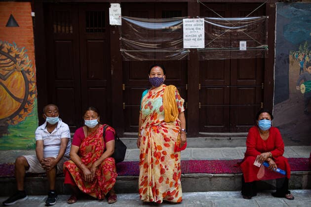 Nepal Continue COVID-19 Vaccination Drive Nepalese people line up to receive a dose of the Vero cell COVID-19 vaccine in Kathmandu, Nepal on Tuesday, June 8, 2021. After receiving 1 million doses of the COVID-19 vaccine from china, the Nepal government has continued vaccination for the 60-64 age groups. Kathmandu Nepal shrestha-notitle210608_npXR8  Copyright: xRojanxShresthax