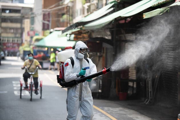 June 8, 2021, Taipei, Taiwan: Soldiers spray disinfectant in a market in Taipei as Taiwan experiences its worst outbreak since the pandemic started. After experiencing a spike of local infections Taiwan s raised its alert to a Level-3, closing schools, recreational facilities and mandating take-out for restaurants. Face masks be worn in all public spaces. Taipei Taiwan - ZUMAo109 20210608_zaf_o109_006 Copyright: xBrennanxO Connorx
