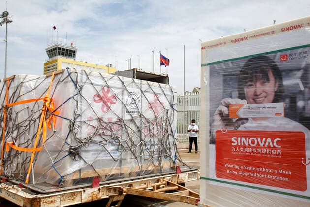 (210608) -- PHNOM PENH, June 8, 2021 -- Photo taken on June 8, 2021 shows packages of Chinese COVID-19 vaccines arriving at the Phnom Penh International Airport in Phnom Penh, Cambodia. Cambodia s COVID-19 vaccination drive has received another boost after the country got a new batch of Chinese vaccines on Tuesday. Cambodian health ministry s secretary of state Yok Sambath said the new arrival included Sinopharm vaccine donated by the Chinese government and those purchased from Chinese biopharmaceutical firm Sinovac Biotech. (Photo by Sovannara Xinhua) CAMBODIA-PHNOM PENH-CHINESE COVID-19 VACCINES-ARRIVAL MaoxPengfei 