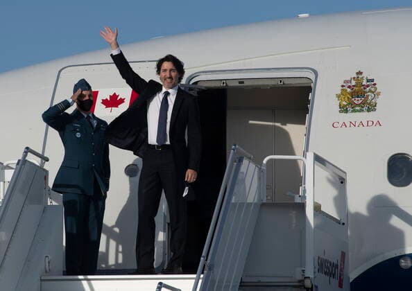 June 10, 2021, Ottawa, on, Canada: Prime Minister Justin Trudeau waves as he boards a government plane at the airport in Ottawa, Thursday, June 10, 2021. Trudeau will participate in the G7 Summit in the United Kingdom and NATO meeting in Belgium. Ottawa Canada  - ZUMAc35_ 20210610_zaf_c35_002 Copyright: xAdrianxWyldx