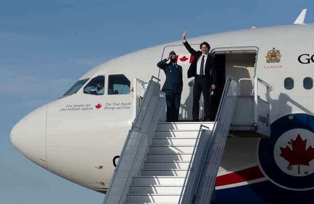 June 10, 2021, Ottawa, on, Canada: Prime Minister Justin Trudeau waves as he boards a government plane at the airport in Ottawa, Thursday, June 10, 2021. Trudeau will participate in the G7 Summit in the United Kingdom and NATO meeting in Belgium. Ottawa Canada  - ZUMAc35_ 20210610_zaf_c35_009 Copyright: xAdrianxWyldx
