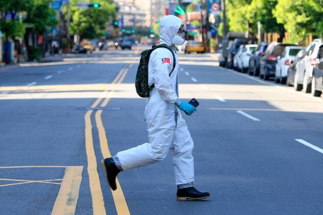 June 12, 2021, New Taipei, New Taipei, Taiwan: A chemical troop soldier disinfecting public areas seen in New Taipei, a zone deeply affected by the community transmission of Covid-19. Taiwan has seen an increasing number of domestic cases and deaths related to the coronavirus while facing an inadequate supply of vaccines. New Taipei Taiwan - ZUMAs313 20210612_zip_s313_010 Copyright: xDanielxCengxShou-Yix