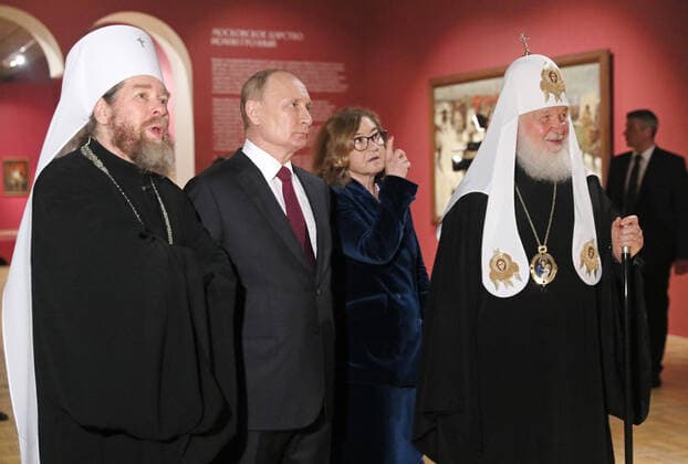 MOSCOW, RUSSIA - JUNE 12, 2021: Metropolitan Tikhon of Pskov and Porkhov (Georgy Shevkunov), Russiaâ€™s President Vladimir Putin, State Tretyakov Gallery Director Zelfira Tregulova, and Patriarch Kirill of Moscow and all Russia (L-R) attend the exhibition History of Russia as seen by Artists. To the 800th Birth Anniversary of Alexander Nevsky at the State Tretyakov Gallery. The exhibition shows over 100 paintings from 37 Russian museums and three private collections. Alexander Shcherbak TASS  TS1046EA