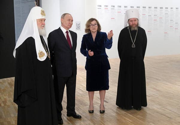 MOSCOW, RUSSIA - JUNE 12, 2021: Patriarch Kirill of Moscow and all Russia, Russiaâ€™s President Vladimir Putin, State Tretyakov Gallery Director Zelfira Tregulova, and Metropolitan Tikhon of Pskov and Porkhov (Georgy Shevkunov), from left, attend the exhibition History of Russia as seen by Artists. To the 800th Birth Anniversary of Alexander Nevsky at the State Tretyakov Gallery. The exhibition shows over 100 paintings from 37 Russian museums and three private collections. Alexander Shcherbak TASS  TS104706