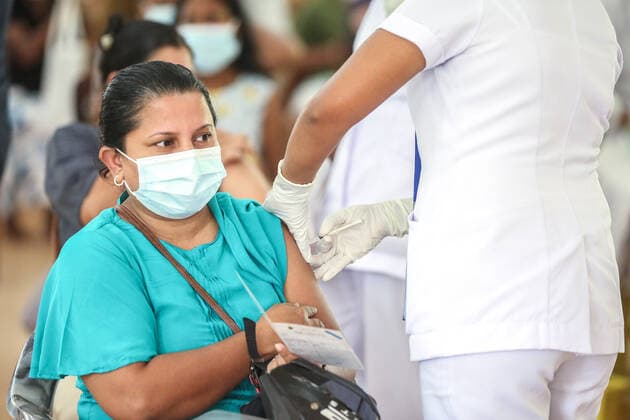 Second dose of Russian Sputnik V covid-19 vaccine in Colombo A health worker inoculates second dose of Russian Sputnik V Covid-19 vaccine in Colombo. Colombo Sri Lanka Copyright: SamanxAbesiriwardana
