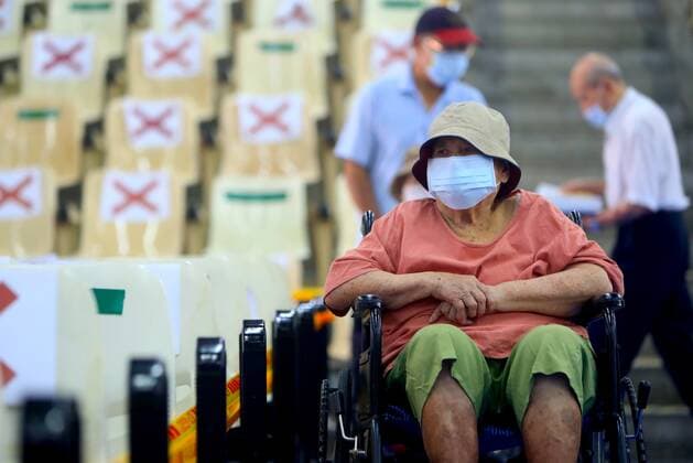 June 15, 2021, New Taipei, New Taipei, Taiwan: Elderly people wait at the observation area after getting vaccinated with the Astra Zeneca vaccine, as the authority commences its nationwide vaccination programmes today, following a local Covid-19 outbreak jeopardising the economy and medical systems with a dramatic surge in death toll and infection rates. The donated 1.24 million doses of Astra Zeneca vaccines by Japan are to be jabbed among six priority groups including medical and disease control workers and people working in high-risk conditions, according to Taiwan CECC, as the island struggles to combat the uncurbed outbreak, New Taipei Taiwan - ZUMAs313 20210615_zip_s313_014 Copyright: xDanielxCengxShou-Yix
