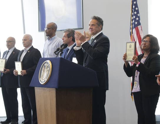 New York Gov. Andrew Cuomo hands out awards after he makes an official announcement that New York State has officially lifted all COVID restrictions and lockdowns at One World Trade Center in New York City on Tuesday, June 15, 2021.  NYP20210615104 JohnxAngelillo