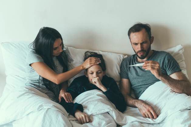 Worried parents taking care of son at home model released Symbolfoto property released OIPF00604