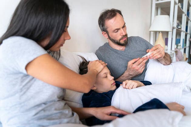 Couple taking care of ill son at home model released Symbolfoto property released OIPF00605