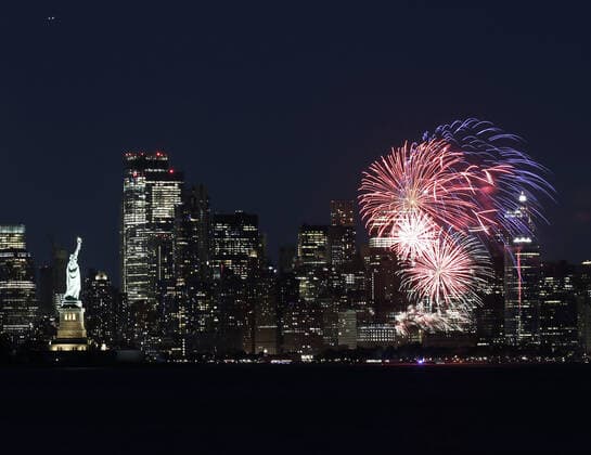 New York City puts on a fireworks show over the Statue Of Liberty and the Manhattan skyline after New York Gov. Andrew Cuomo announces that New York State has officially lifted all COVID restrictions and lockdowns in Bayonne, New Jersey on Tuesday, June 15, 2021.  NYP20210615132 JohnxAngelillo
