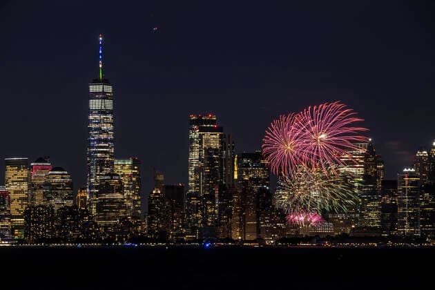 (210616) -- NEW YORK, June 16, 2021 -- Fireworks blow up near the One World Trade Center lighted in gold and blue in a bid to celebrate New York s achievement of the COVID-19 vaccination milestone in New York, the United States, on June 15, 2021. New York State Governor Andrew Cuomo Tuesday announced the immediate lifting of major COVID-19 restrictions across the state as 70 percent of adults in the state have received at least one dose of COVID-19 vaccine. (Photo by Xinhua) U.S.-NEW YORK-VACCINATION MILESTONE WinstonxZhou 
