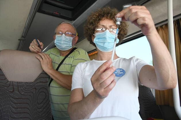 Croatia Coronavirus vaccine bus A medical worker prepares to administer a dose of the COVID-19 vaccine at Coronavirus vaccine bus in Bjelovar, Croatia on June 17, 2021. Coronavirus vaccine bus travelling around city of Bjelovar and suburbs offering a walk-in vaccine service. DamirxSpehar PIXSELL